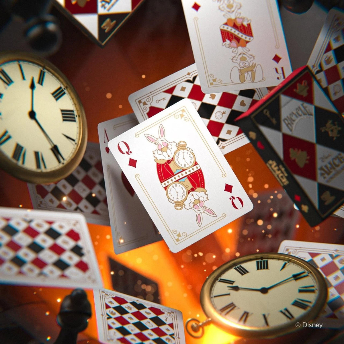 Bicycle Alice in Wonderland royal court cards and diamond-patterned backs displayed among pocket watches and warm lights.