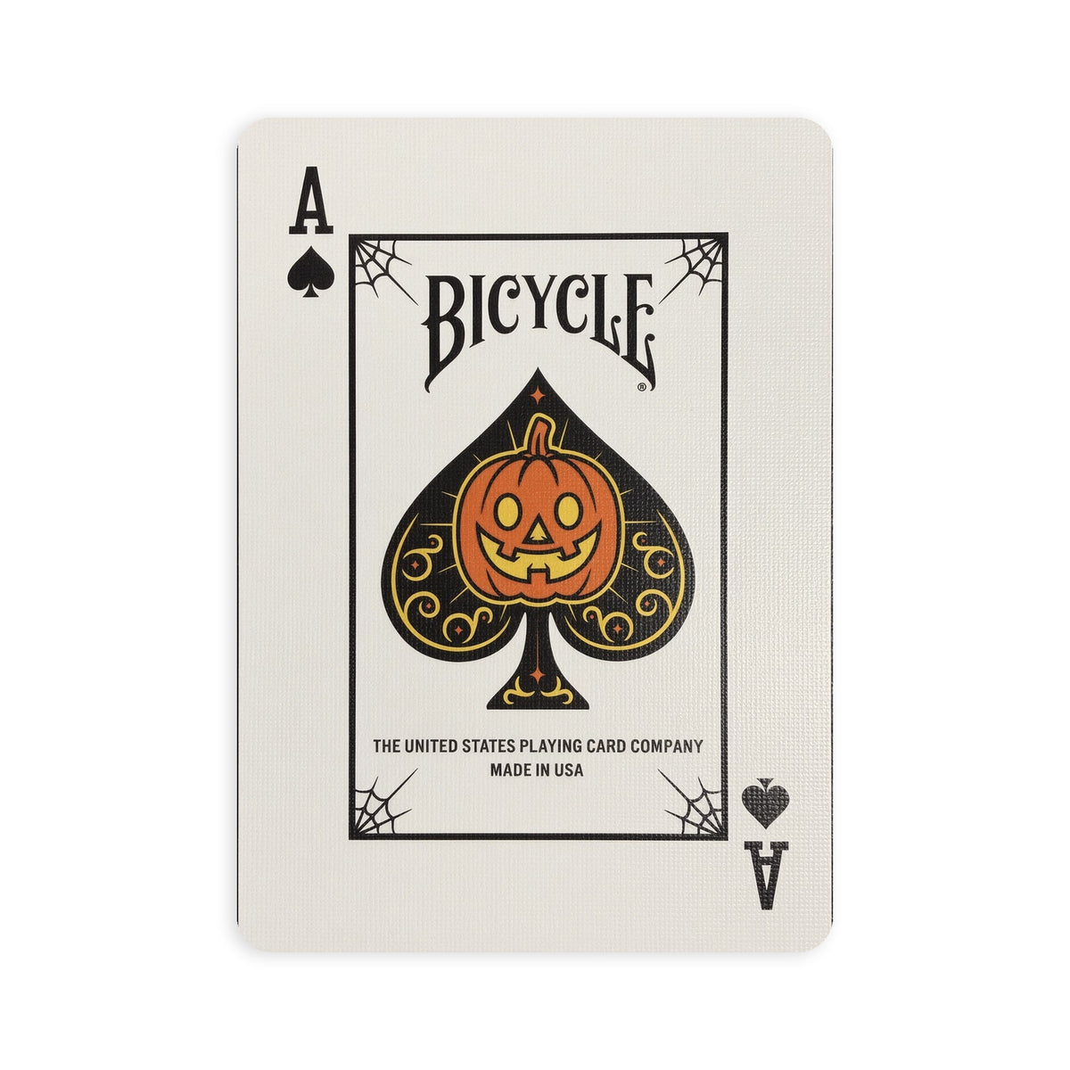 Custom Ace of Spades from Bicycle Classic Halloween featuring a smiling orange jack-o’-lantern inside an ornate black-and-gold spade.