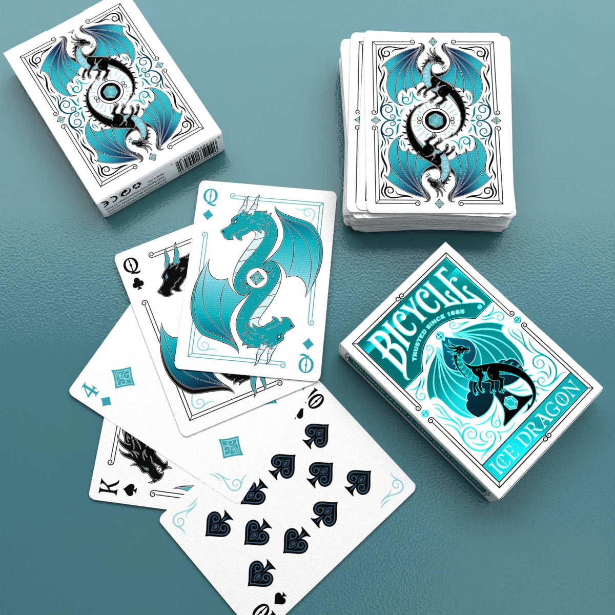 Bicycle Ice Dragon deck beside front and rear tuck-box views and a fan of dragon courts and number cards