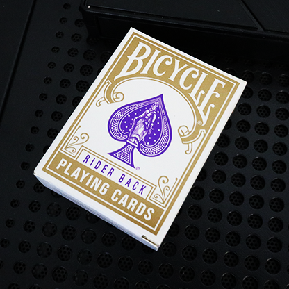 Front of Bicycle Mini Gold Rider Back Playing Cards tuck box with gold Bicycle branding and purple spade emblem