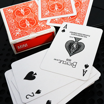Bicycle Mini Orange Playing Cards showing traditional faces, Ace of Spades, orange backs, and Mini tuck box