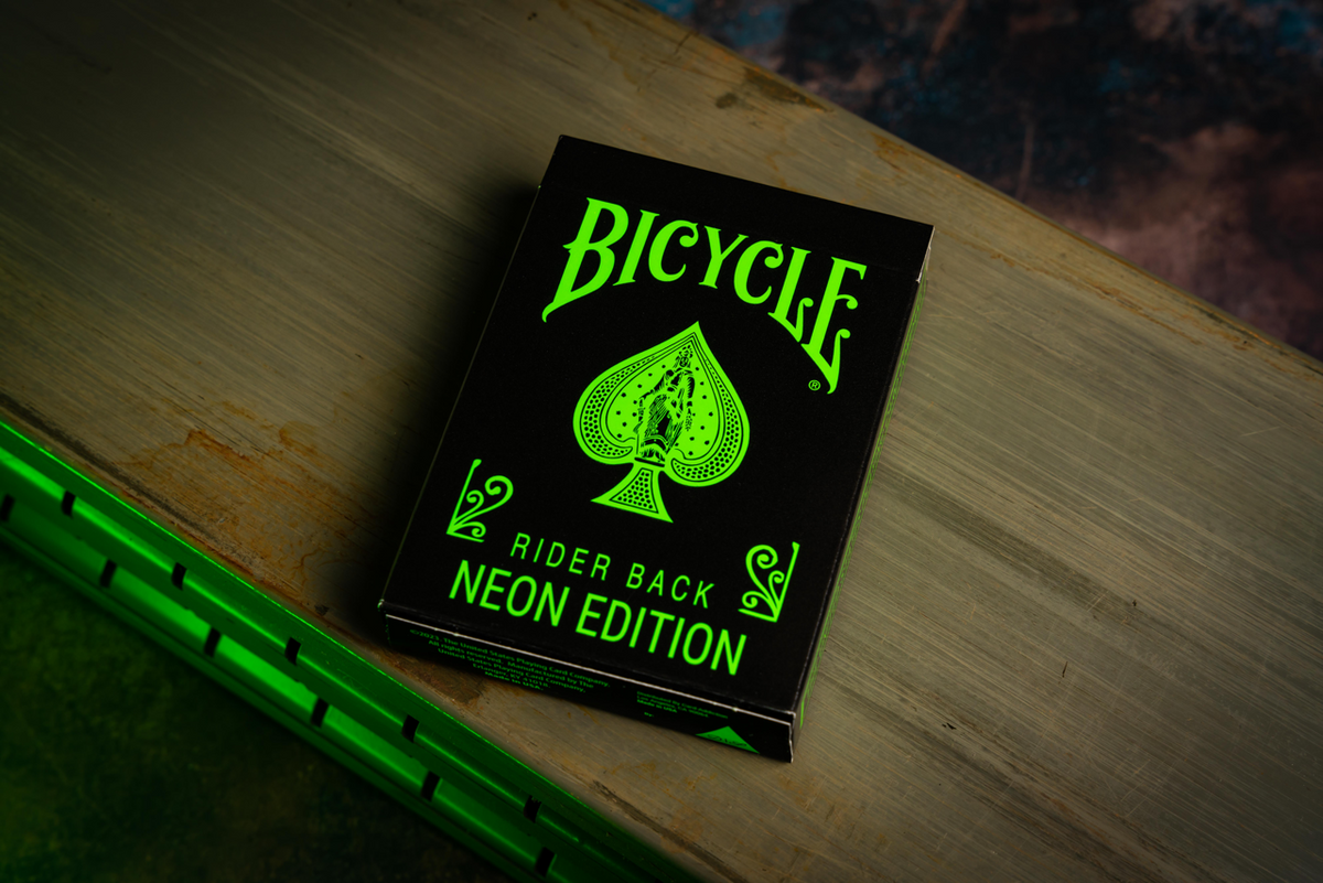 Bicycle Neon Green-Glo green tuck box in ambient light