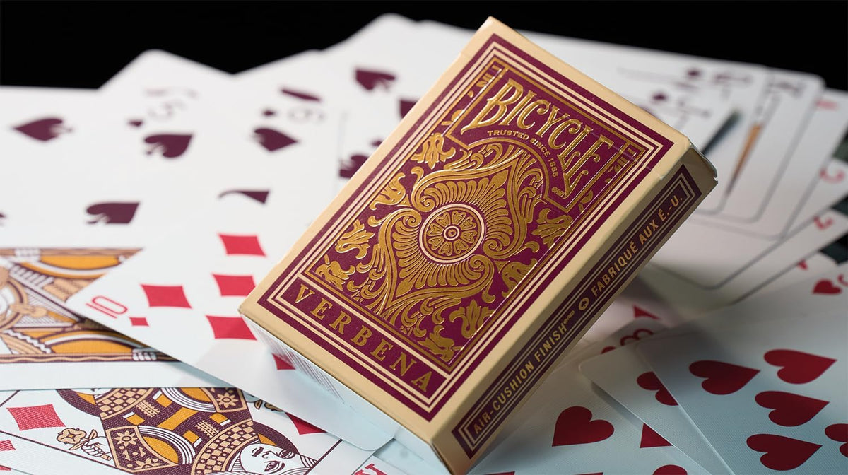 Bicycle Verbena burgundy tuck box with metallic gold foil and embossed ornamental detailing