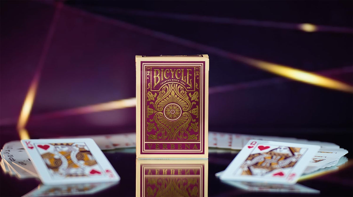 Bicycle Verbena Playing Cards tuck standing upright with cards arranged on a reflective surface