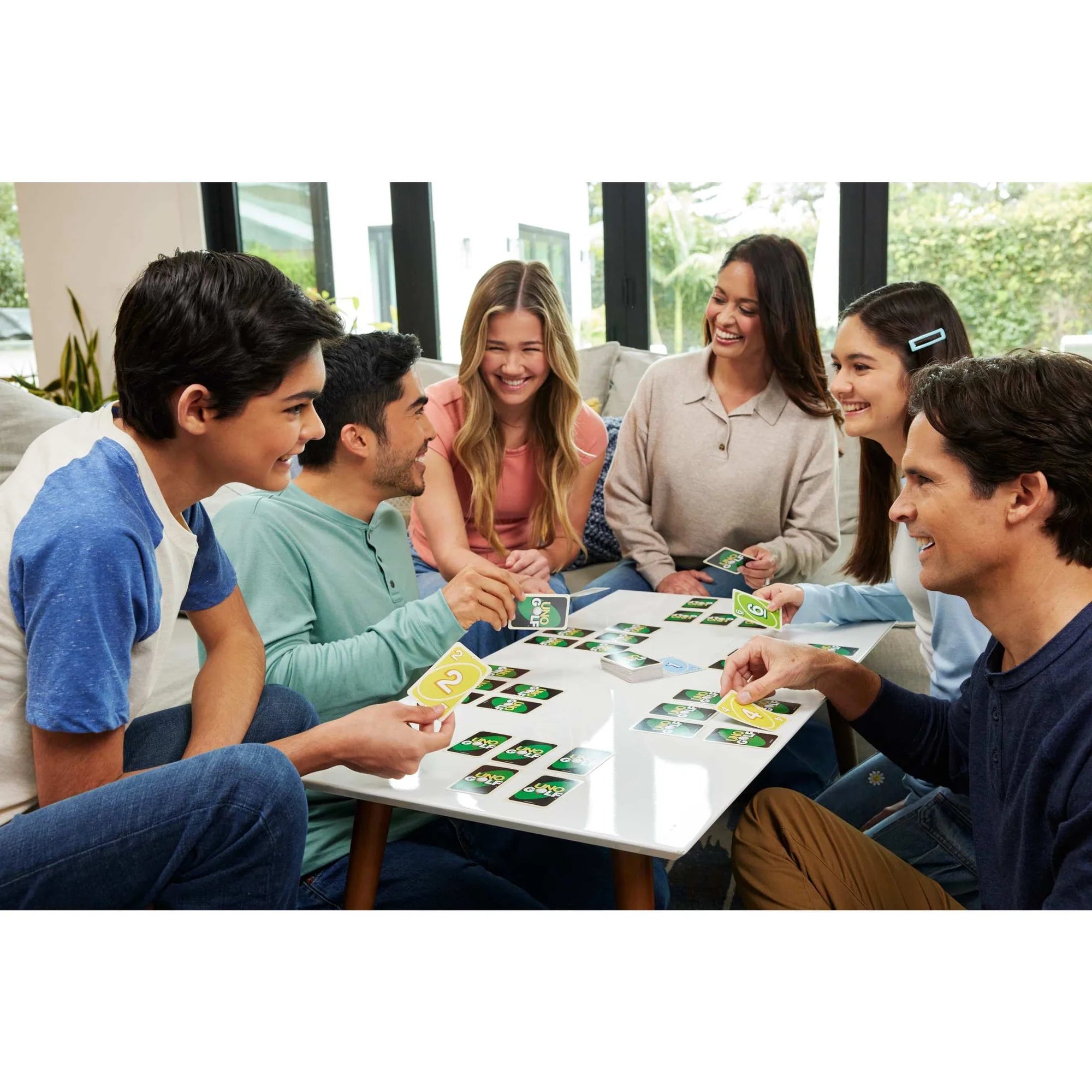 Family playing the UNO Golf low-score card game