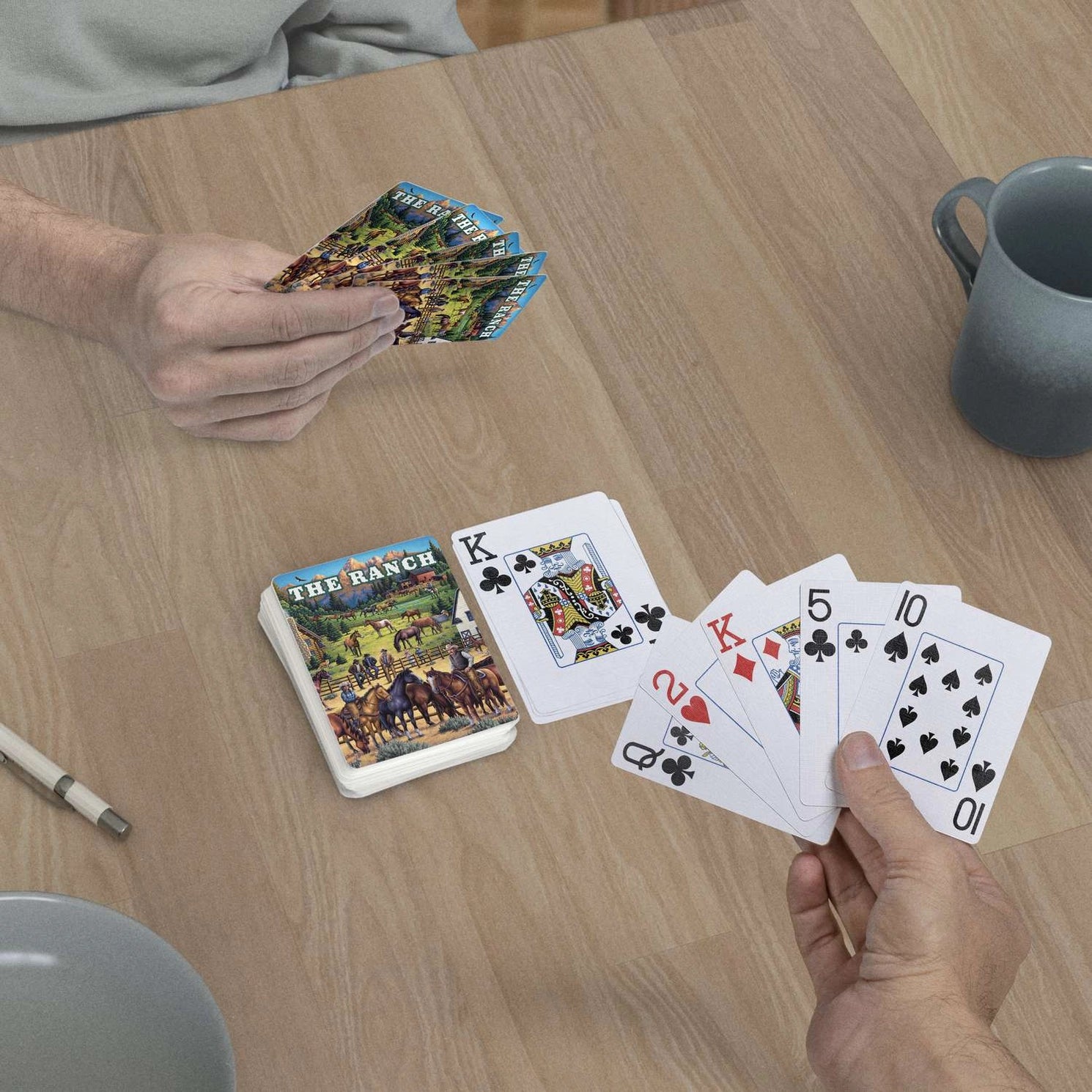 The Ranch Playing Cards by Boardwalk deck on table with jumbo index playing-card faces