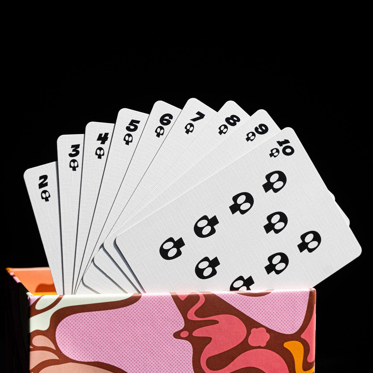 Monster Cereals number cards from two through ten fanned out to show the custom black skull pips.