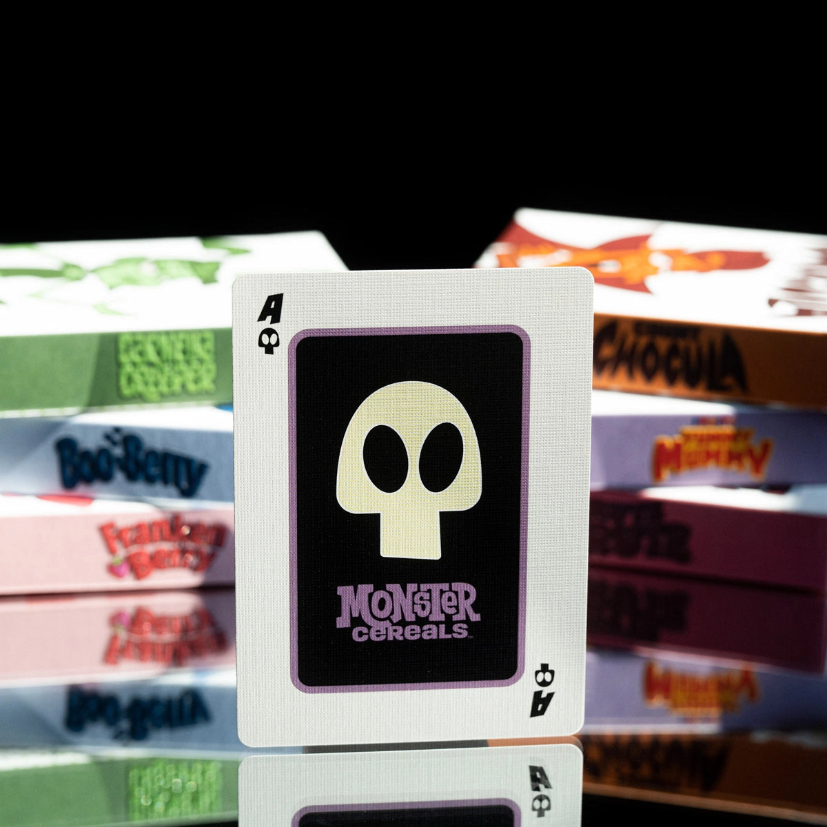 Monster Cereals Ace with a large cream skull symbol, black center, and purple border.