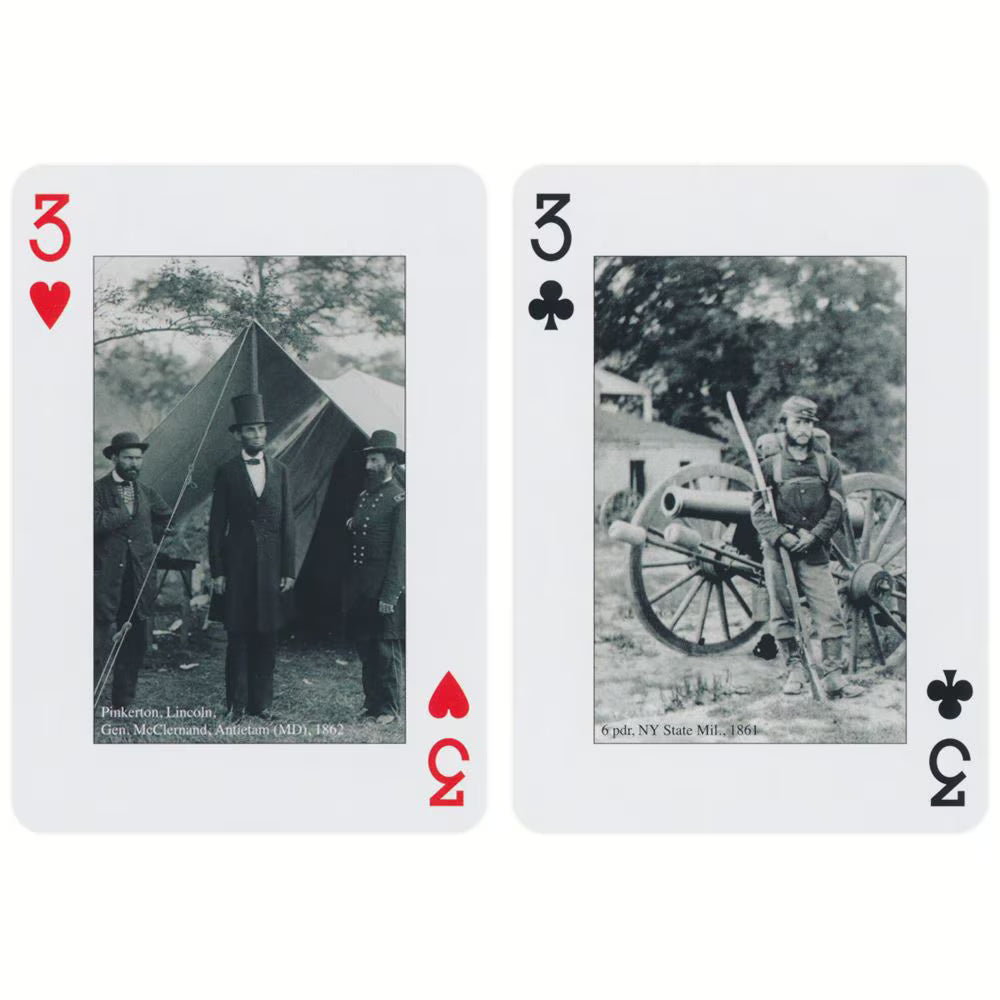 Two playing cards with historical images and text on a white background