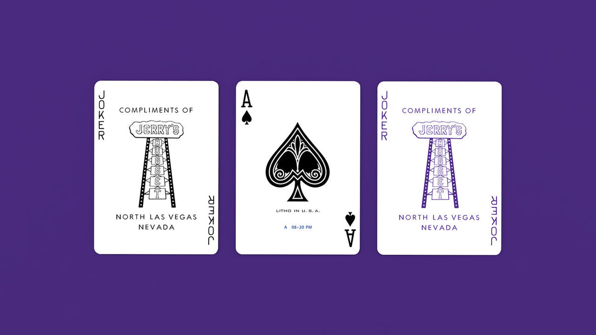 Jerry’s Nugget Royal Purple Ace of Spades between black and purple casino-sign Jokers.