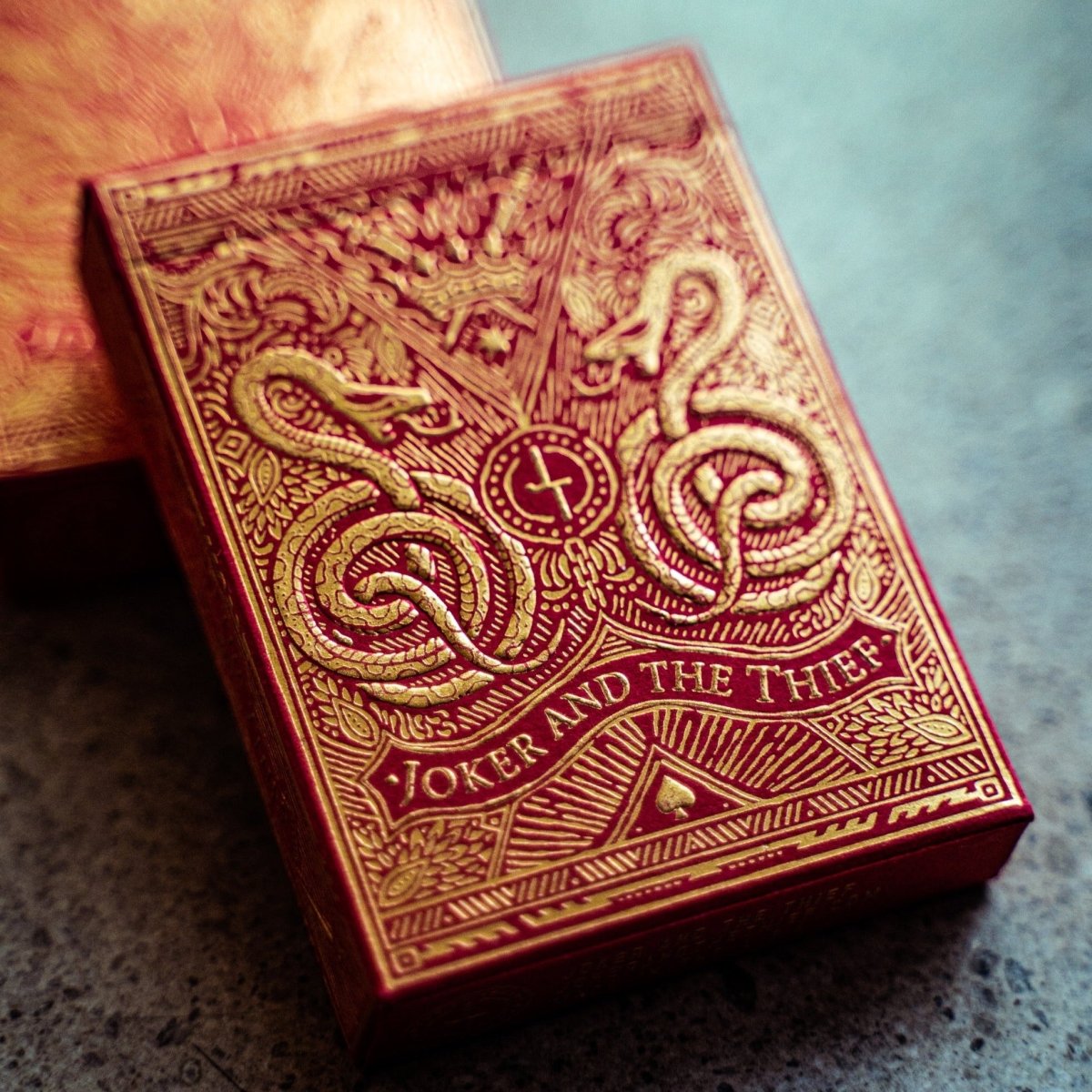 Joker and the Thief Blood Red Edition tuck box with gold foil artwork