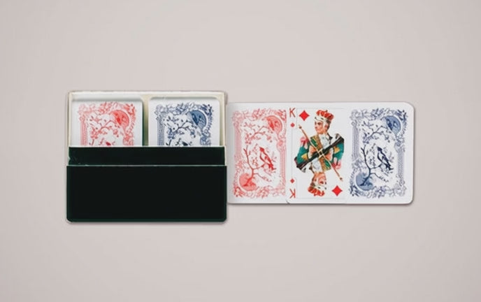 Piatnik Mini Patience cards in plastic case with red and blue card backs and small illustrated court cards moving on top of each other