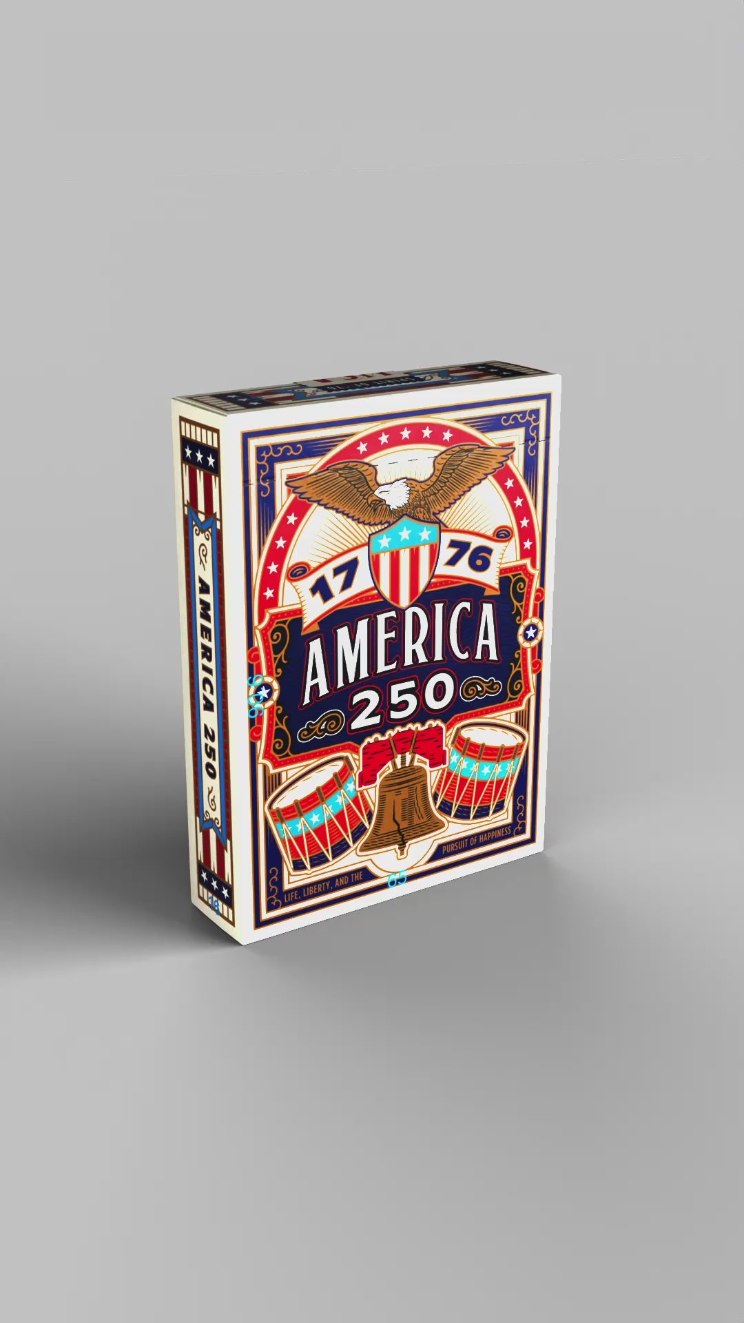 Rotating product view of the Remembrance America 250 playing card tuck box showing the front, back, sides, top, and bottom.
