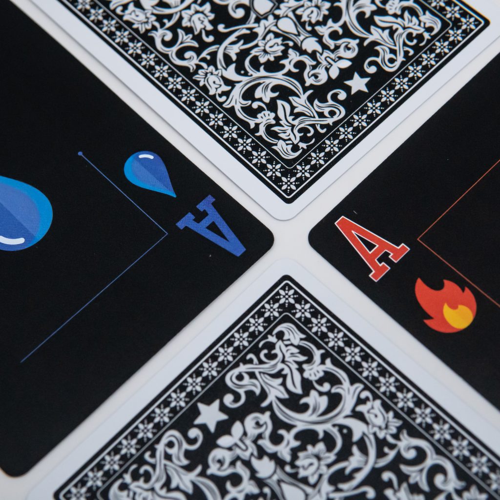Repoker Black elemental aces and black-and-white patterned card backs