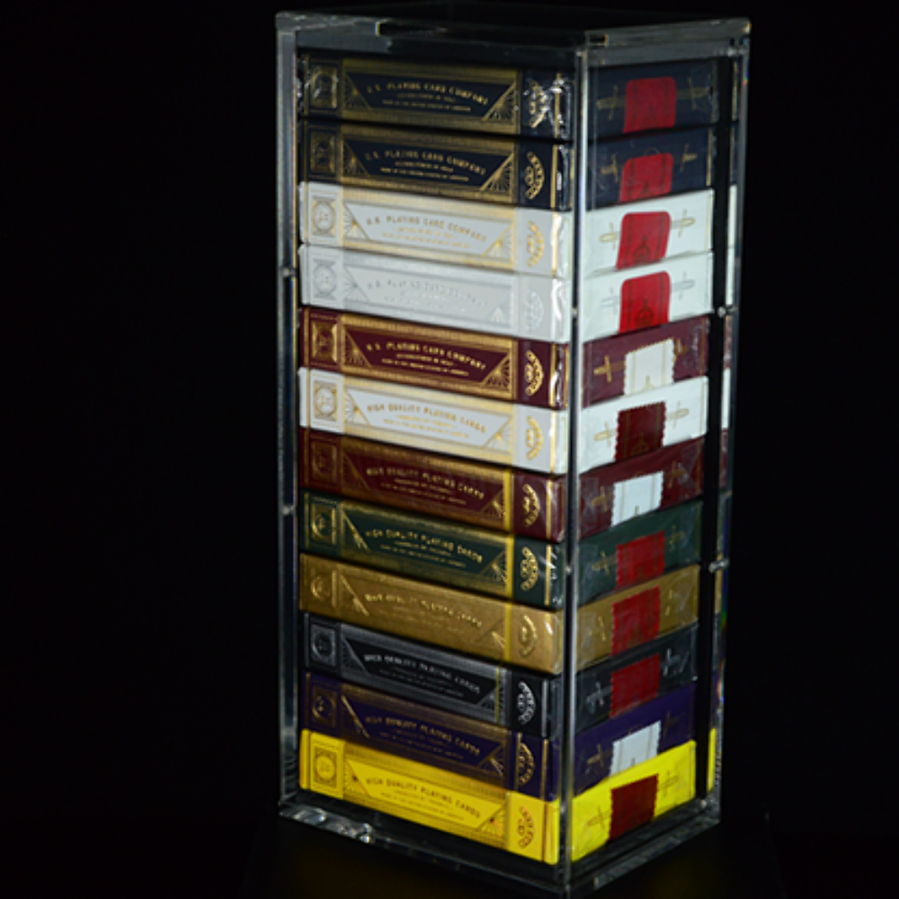 Carat X12 clear acrylic brick case displayed upright with 12 collector playing card decks