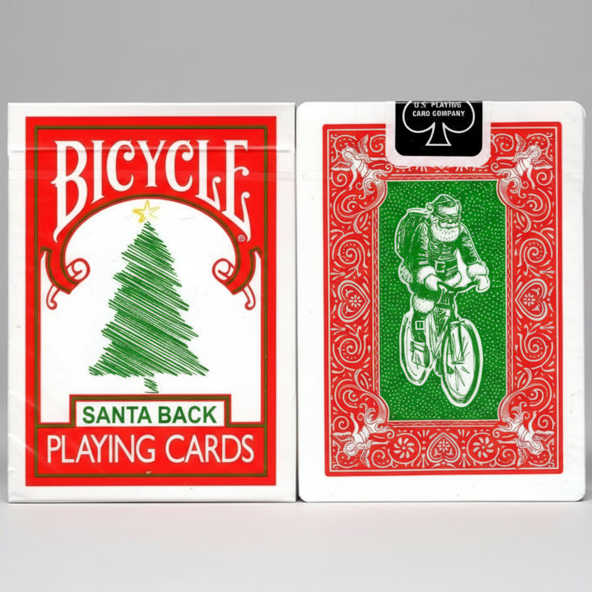 Bicycle Santa Back playing cards with a tree and cyclist design on the cover.