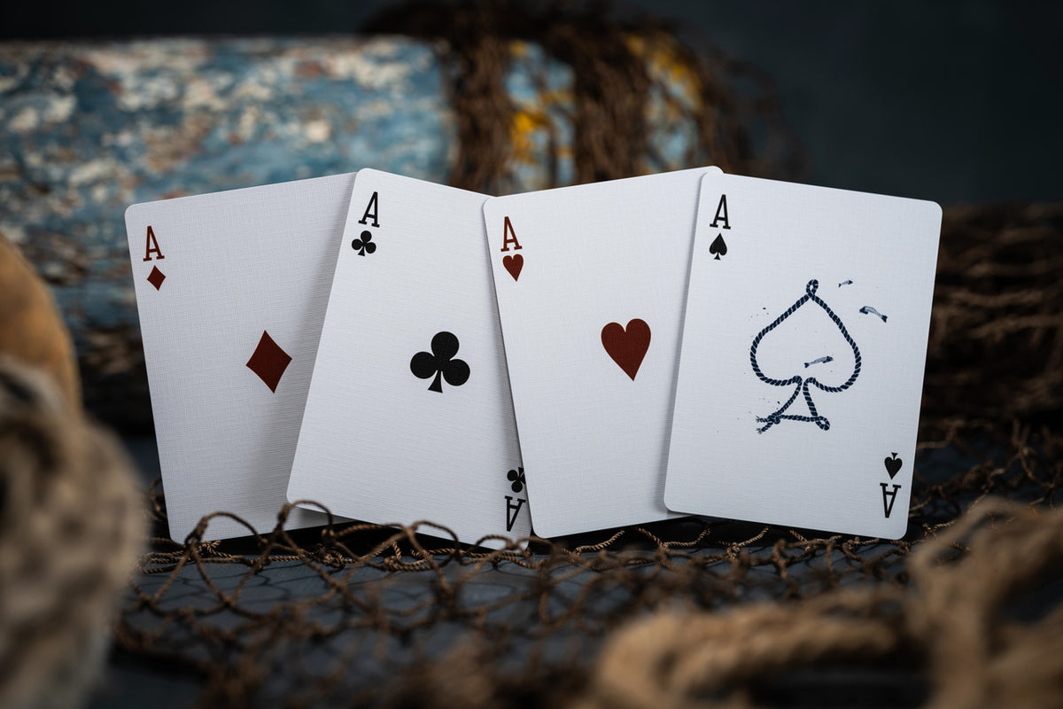Custom Ace artwork used in Sunken Anchors Blue Gilded playing cards, including the rope-inspired Ace of Spades.