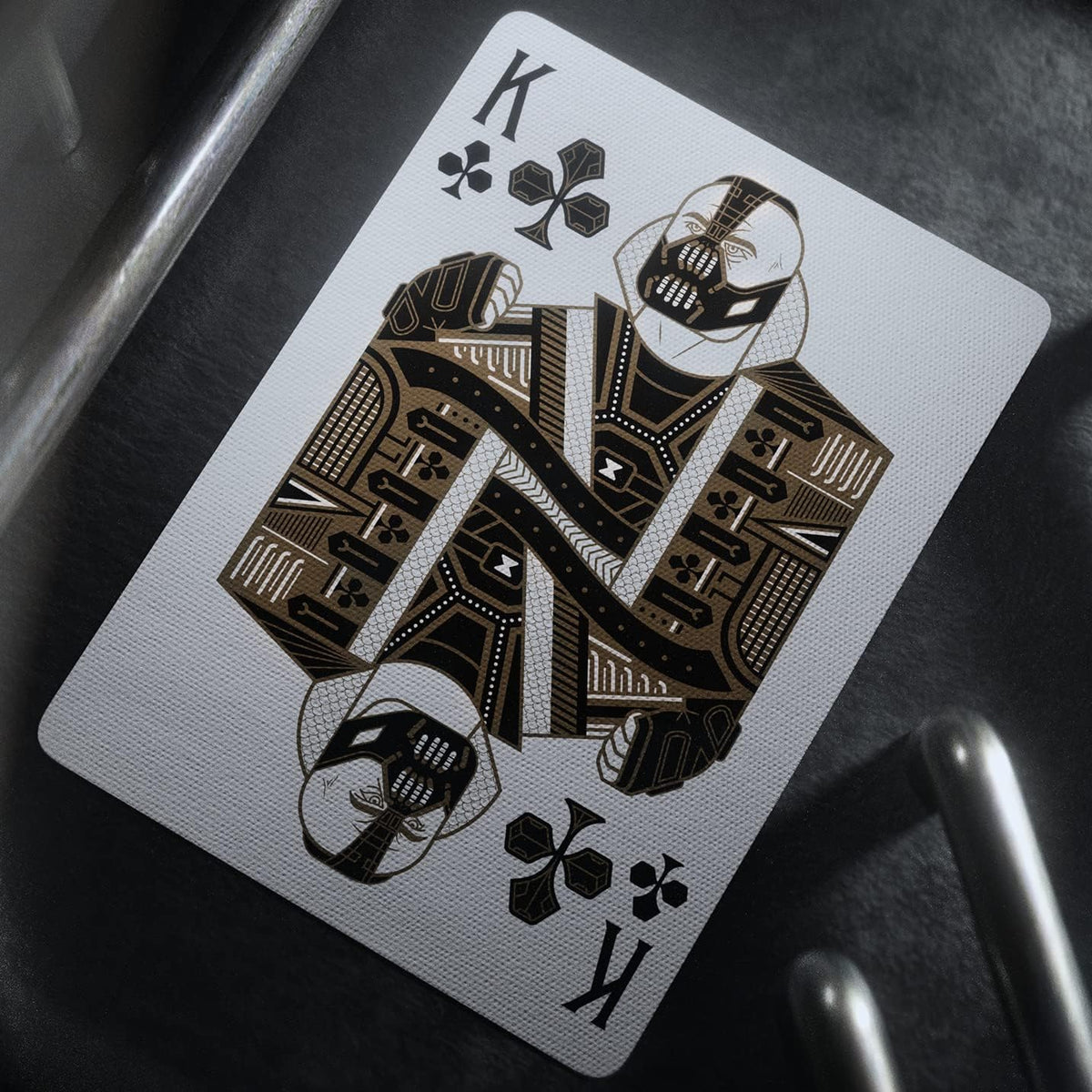 Bane as the King of Clubs in theory11 The Dark Knight Playing Cards, featuring his mask and mirrored court artwork.