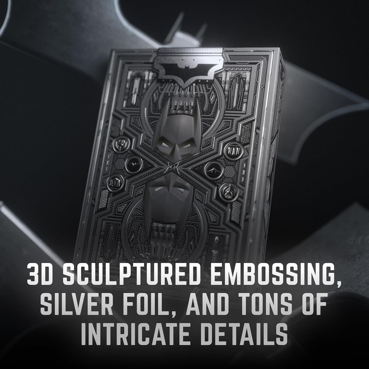 Rear of the theory11 The Dark Knight tuck box with mirrored Batman cowls and text highlighting silver foil and sculptured embossing.