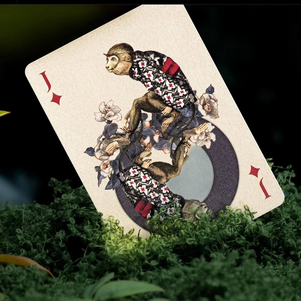 Moooi Tokyo Blue Jack of Diamonds featuring mirrored monkeys in patterned clothing surrounded by flowers.