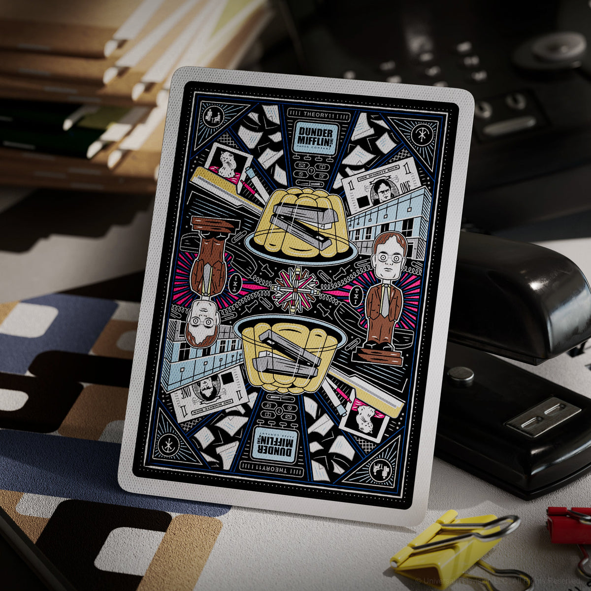 The Office Playing Cards back design featuring mirrored office-themed illustrations