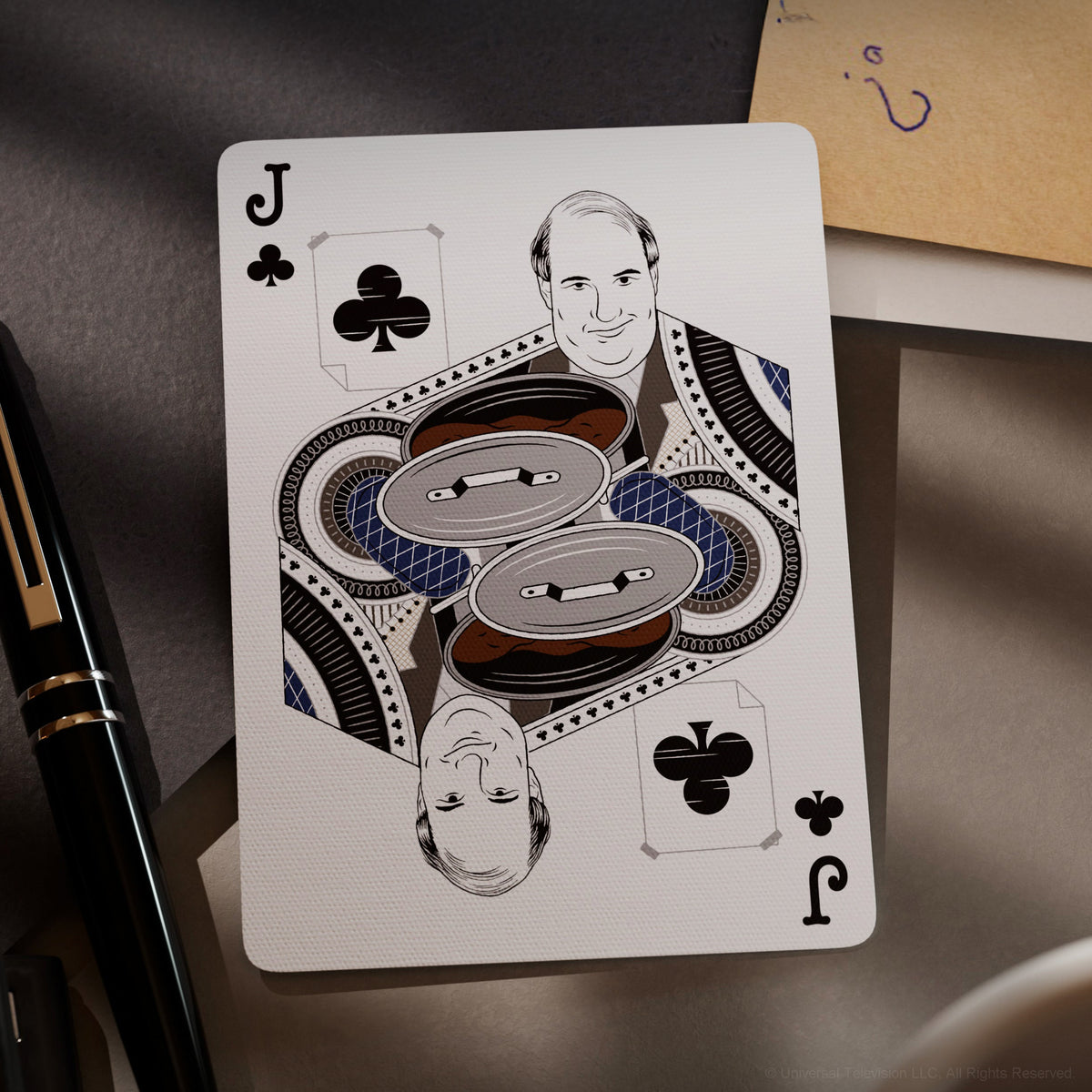 Kevin Malone illustrated on The Office Playing Cards Jack of Clubs with pots of chili