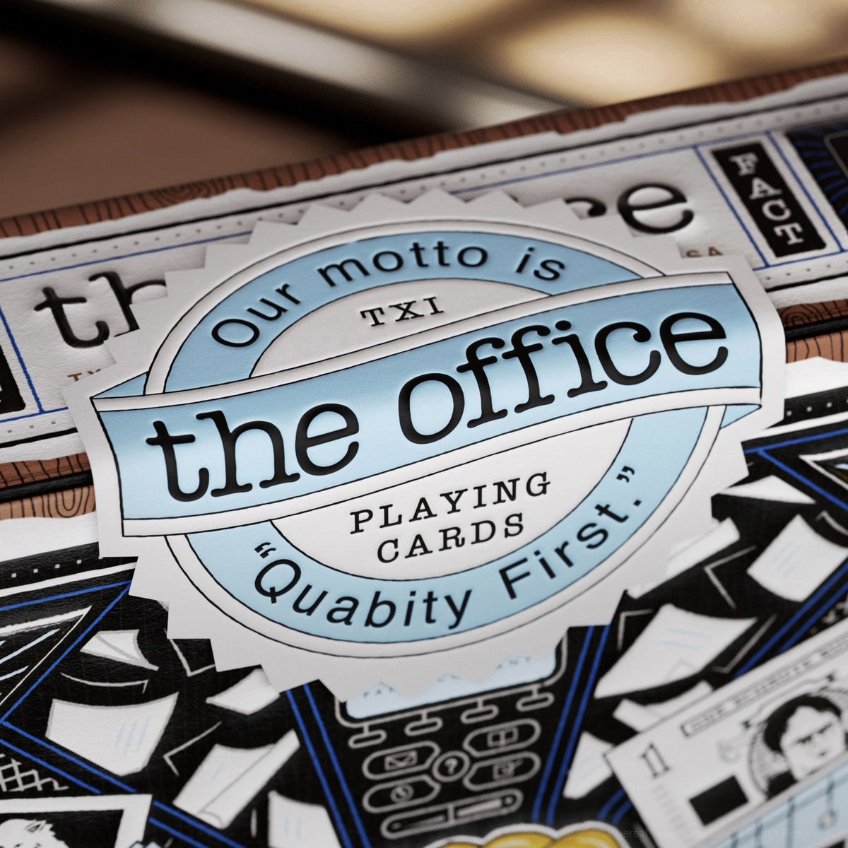 Close-up of The Office Playing Cards box seal reading Quabity First