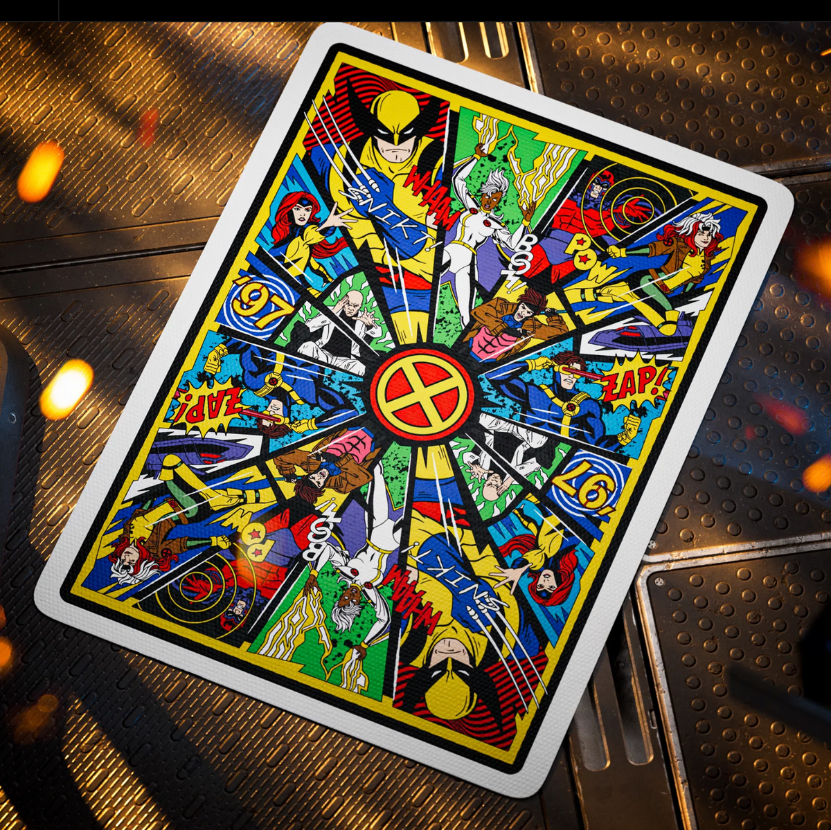 Theory11 X-Men card back with mirrored character panels, comic sound effects, a central X emblem, and a white border.