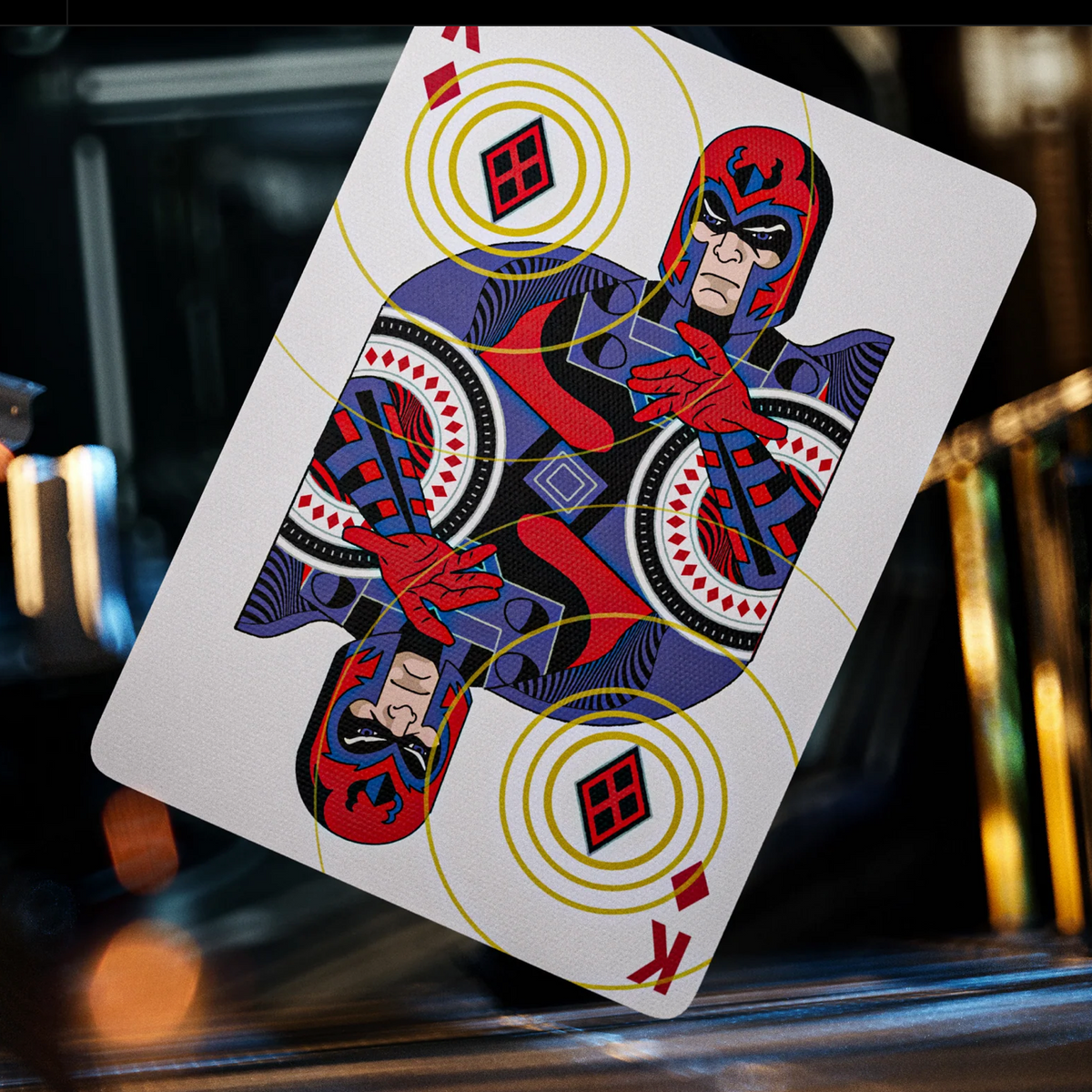 Magneto as the King of Diamonds in theory11 X-Men Playing Cards, wearing his helmet amid yellow magnetic-field rings.
