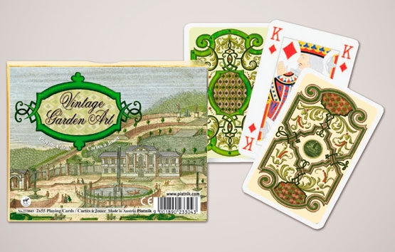 Playing cards with vintage garden art design on a gray background