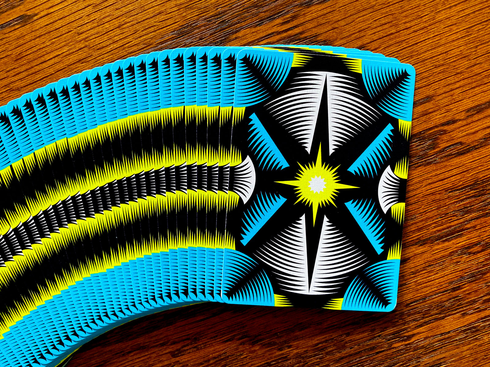 Close view of the borderless geometric back design on Vanda Polaris Winter Solstice Playing Cards