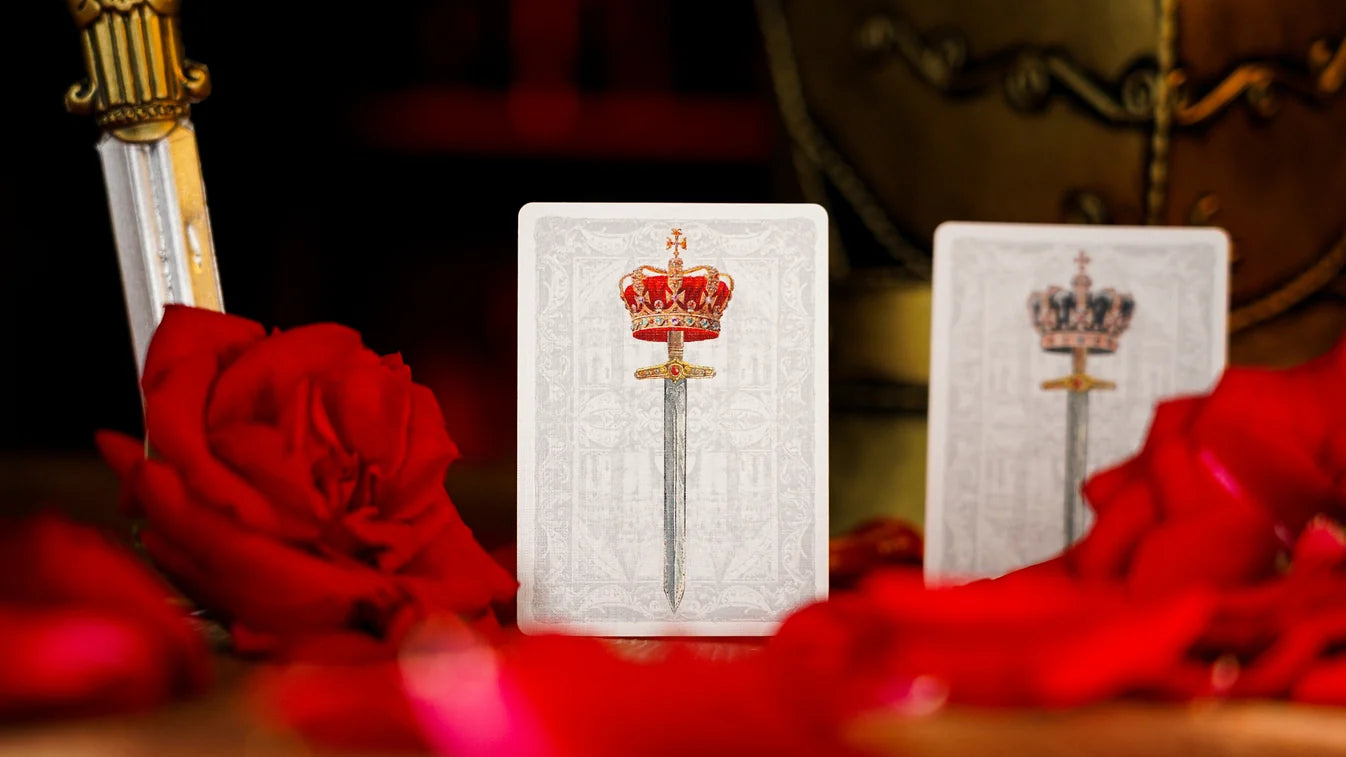 Two Fortress Playing Cards Jokers featuring crowned swords