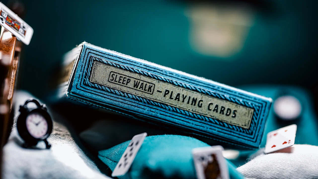 Side of Sleep Walk Playing Cards tuck box with illustrated blue border