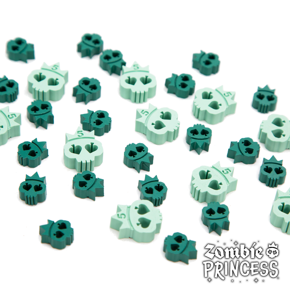 Green zombie skull tokens included in Zombie Princess Deluxe Edition.